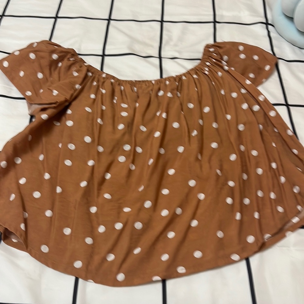 Women’s hem & thread top